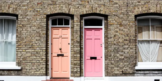 coral and pink door for apartment complex