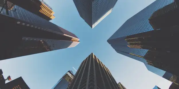 view of skyscrapers looking upwards