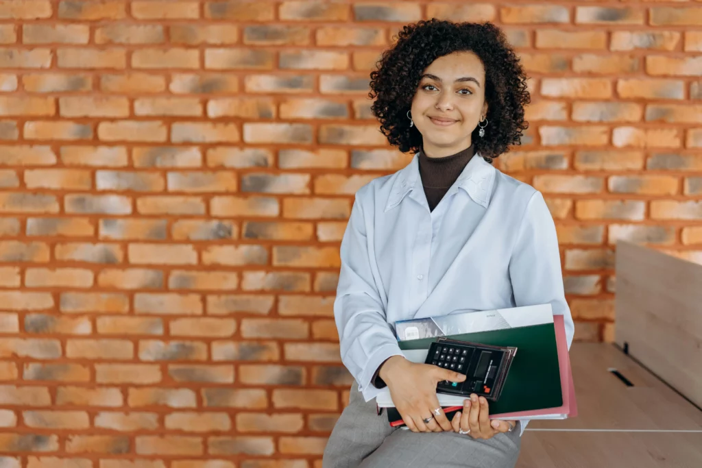 A confident person prepared with title loan documents.