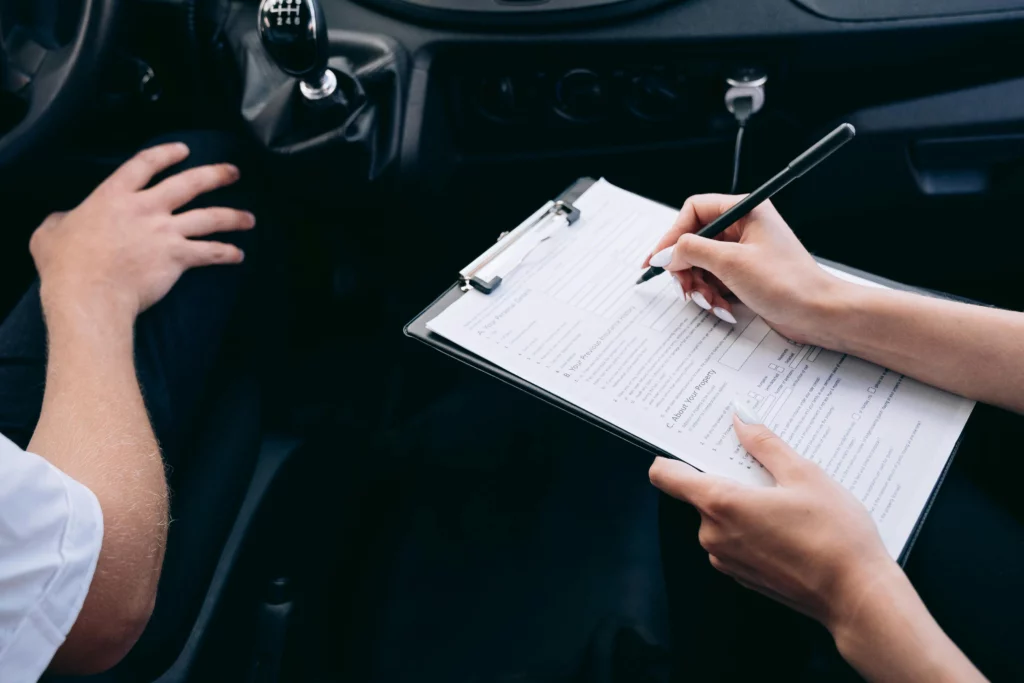 Vehicle registration documentation in car.